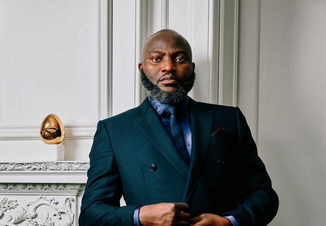 Dozy Mmobuosi wears a suit